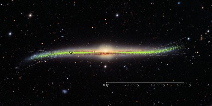 Obraz galaktyki z zakrzywionym dyskiem. Kropki odpowiadają położeniom cefeid w Drodze Mlecznej (J. Skowron / OGLE / Obserwatorium Astronomiczne UW)