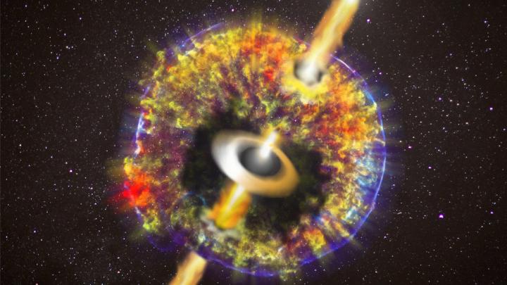 Wizja artystyczna zlania się gwiazd neutronowych z całą otoczką wyrzuconą podczas zjawiska (NASA/CXC/GSFC/B.Williams et al.)